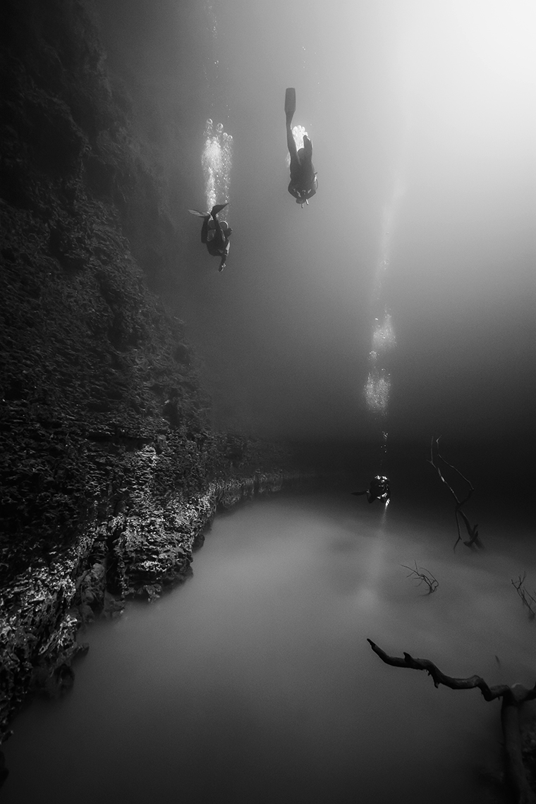 Divers in Cenote Angelita